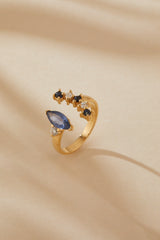 18k yellow gold Marquis Sapphire, diamonds and round sapphires ring