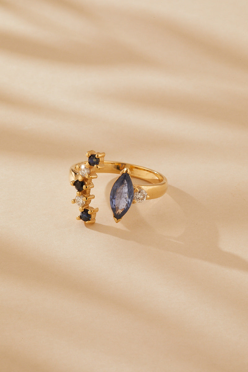 18k yellow gold Marquis Sapphire, diamonds and round sapphires ring